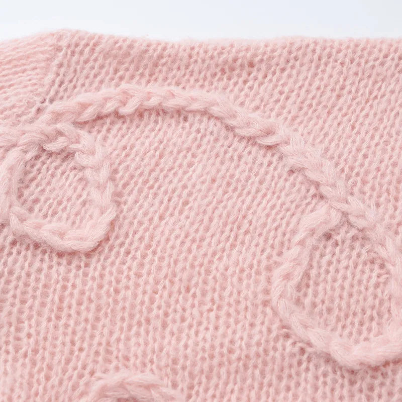Vermène™ - Pull en maille torsadée à effet broderie