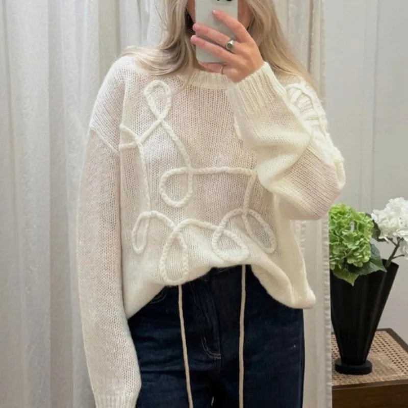 Vermène™ - Pull en maille torsadée à effet broderie